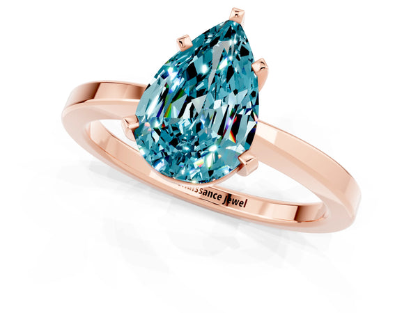 Rose gold Pear Cut Blue Topaz Solitaire Engagement Ring with Classic Band and Four-Prong Setting