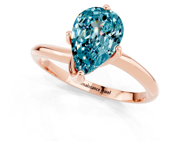 Rose gold Pear Cut Blue Topaz Solitaire Engagement Ring with Four-Prong Setting and Classic Band