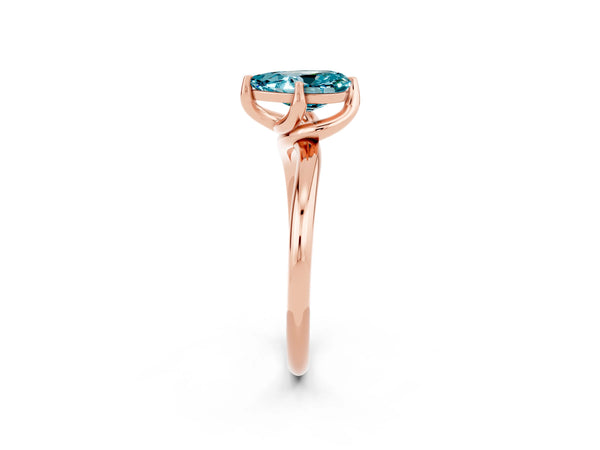 Rose gold Pear Cut Blue Topaz Solitaire Engagement Ring with Four-Prong Setting and Classic Band