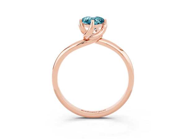 Rose gold Pear Cut Blue Topaz Solitaire Engagement Ring with Four-Prong Setting and Classic Band