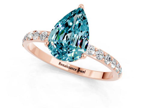 Rose gold Pear Cut Blue Topaz Solitaire Engagement Ring with Pavé Band and Prong Setting_1