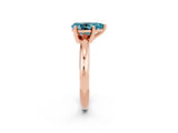 Rose gold Pear Cut Blue Topaz Solitaire Engagement Ring with Round Band and Four-Prong Setting_2