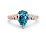 Rose gold Pear Cut Blue Topaz Solitaire Pavé Band with Four-Prong Setting