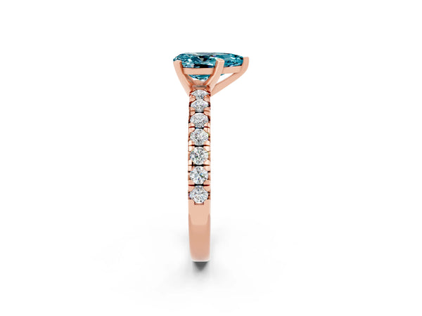 Rose gold Pear Cut Blue Topaz Solitaire Pavé Engagement Ring with Round Band and Prong Setting