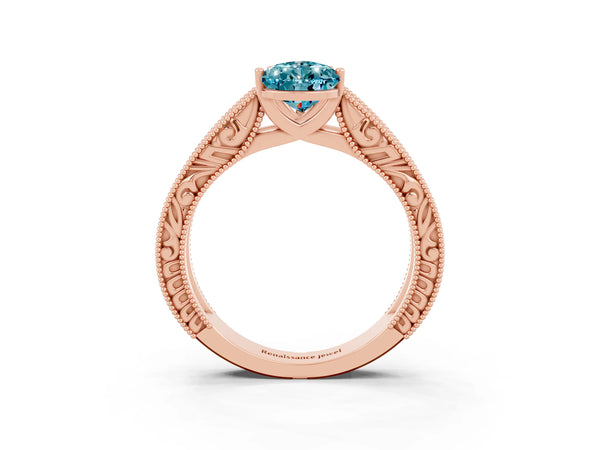 Rose gold Pear Cut Blue Topaz Solitaire Ring with Engraved Band and Four-Prong Setting