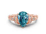 Rose gold Pear Cut Blue Topaz Solitaire Ring with Filigree Band and Four-Prong Setting_24