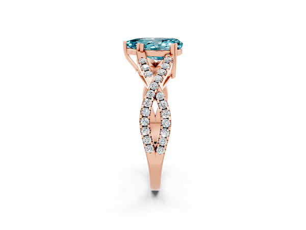 Rose gold Pear Cut Blue Topaz Solitaire Ring with Four-Prong Setting and Twisted Pavé Band