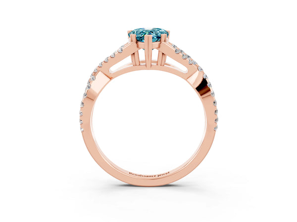 Rose gold Pear Cut Blue Topaz Solitaire Ring with Four-Prong Setting and Twisted Pavé Band