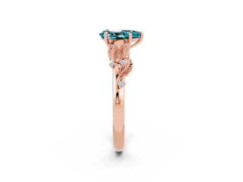 Rose gold Pear Cut Blue Topaz Solitaire Ring with Leaf Motif Band and Four-Prong Setting_2