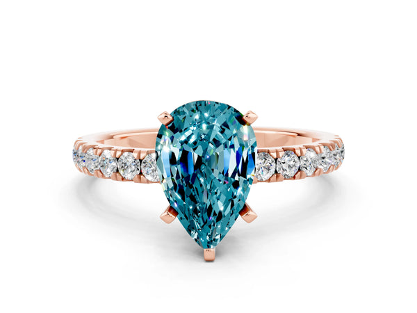 Rose gold Pear Cut Blue Topaz Solitaire Ring with Pavé Accents and Four-Prong Setting