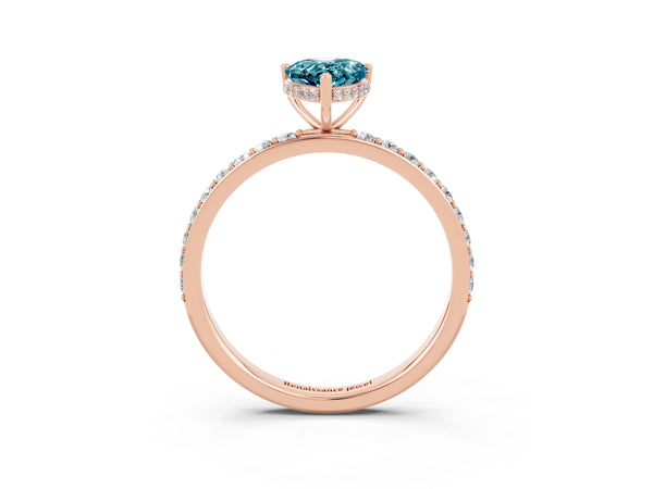 Rose gold Pear Cut Blue Topaz Solitaire Ring with Pavé Band and Hidden Halo