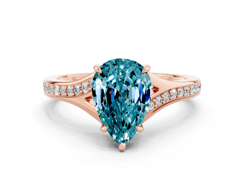 Rose gold Pear Cut Blue Topaz Solitaire Ring with Pavé Band and Prong Setting