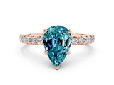 Rose gold Pear Cut Blue Topaz Solitaire Ring with Round  Pavé Band and Four-Prong Setting_44