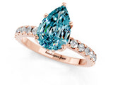 Rose gold Pear Cut Blue Topaz Solitaire Ring with Round  Pavé Band and Four-Prong Setting_45