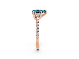 Rose gold Pear Cut Blue Topaz Solitaire Ring with Round  Pavé Band and Four-Prong Setting_46