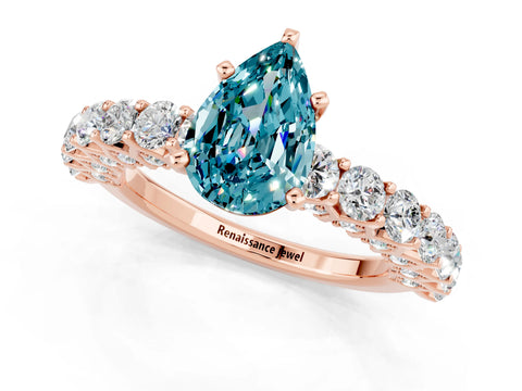 Rose gold Pear Cut Blue Topaz Solitaire Ring with Shared Prong Pavé Band and Four-Prong Setting_1