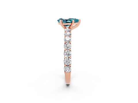 Rose gold Pear Cut Blue Topaz Solitaire Ring with Shared Prong Pavé Band and Four-Prong Setting_2