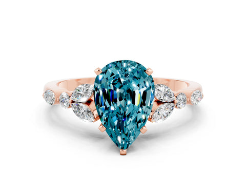 Rose gold Pear Cut Blue Topaz Solitaire Ring with Side Stones and Four-Prong Setting_12