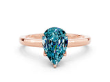 Rose gold Pear Cut Blue Topaz Solitaire Ring with Thin Band and Prong Setting_12