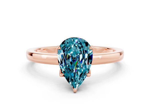 Rose gold Pear Cut Blue Topaz Solitaire Ring with Thin Band and Prong Setting