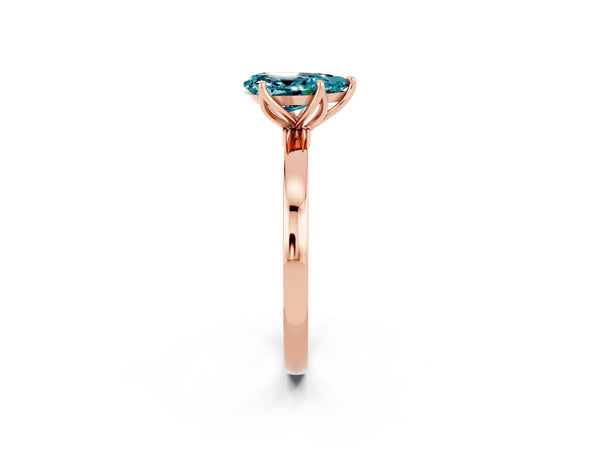Rose gold Pear Cut Blue Topaz Solitaire Ring with Thin Band and Prong Setting