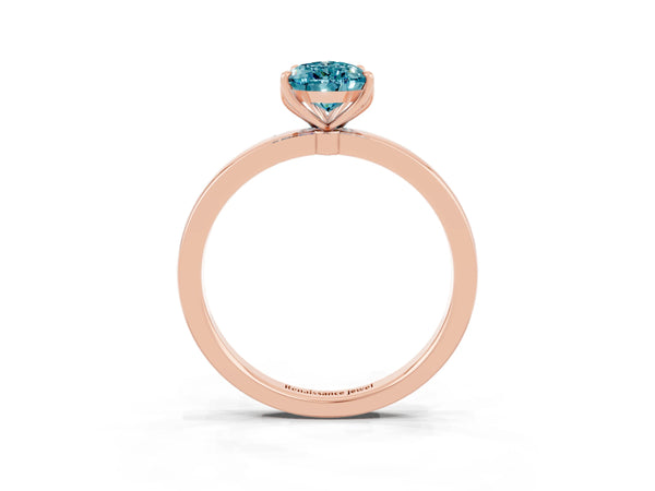 Rose gold Pear Cut Blue Topaz Solitaire Ring with Thin Band and Prong Setting