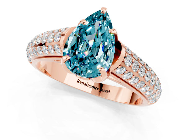 Rose gold Pear Cut Blue Topaz Solitaire Ring with Three-Row Pavé Band and Four-Prong Setting