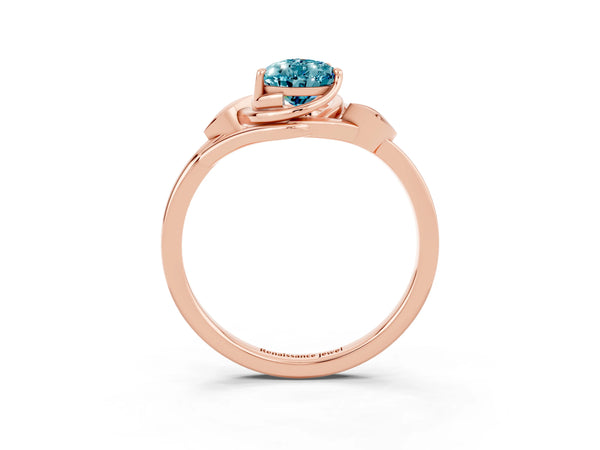 Rose gold Pear Cut Blue Topaz Solitaire Ring with Twist Band and Four-Prong Setting