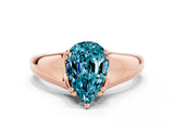 Rose gold Pear Cut Blue Topaz Solitaire Ring with Wide Band and Prong Setting