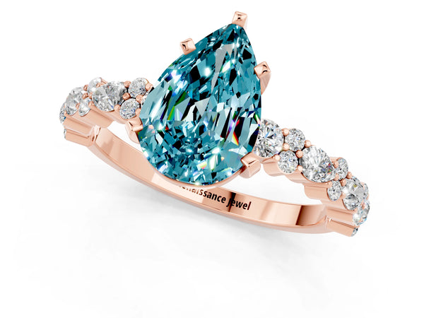 Rose gold Pear Cut Blue Topaz Side Stone Solitaire Ring with Round  and Four-Prong Setting
