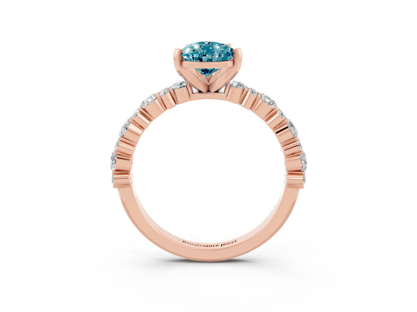 Rose gold Pear Cut Blue Topaz Side Stone Solitaire Ring with Round  and Four-Prong Setting