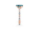 Rose gold Pear Cut Blue Topaz Solitaire with Side Stones on a Pavé Band and Four-Prong Setting_2