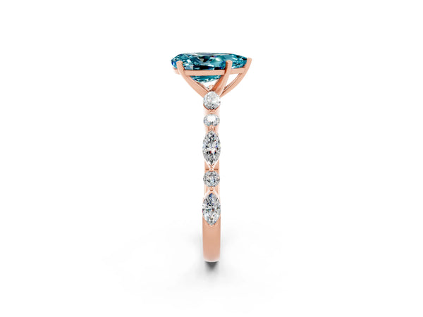 Rose gold Pear Cut Blue Topaz Ring with Marquise and Round  Side Stones and Four-Prong Setting