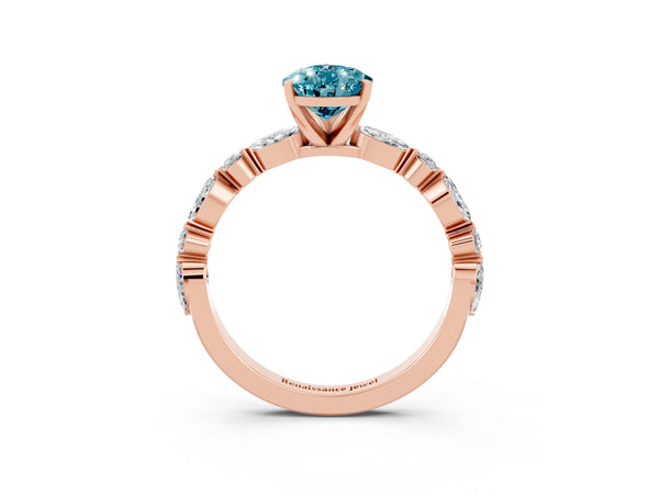 Rose gold Pear Cut Blue Topaz Ring with Marquise and Round  Side Stones and Four-Prong Setting