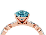 Rose gold Pear Cut Blue Topaz Solitaire with Side Stones on a Pavé Band and Four-Prong Setting_4