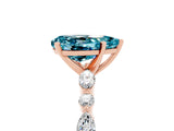 Rose gold Pear Cut Blue Topaz Solitaire with Side Stones on a Pavé Band and Four-Prong Setting_5