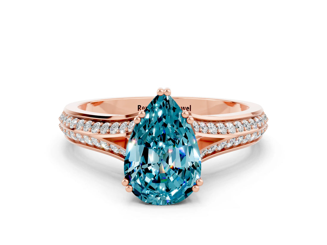 Rose gold Pear Cut Blue Topaz Split Shank Engagement Ring with Pavé Band
