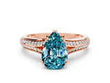Rose gold Pear Cut Blue Topaz Split Shank Engagement Ring with Pavé Band
