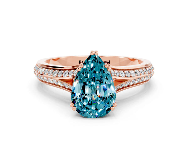 Rose gold Pear Cut Blue Topaz Split Shank Engagement Ring with Pavé Band