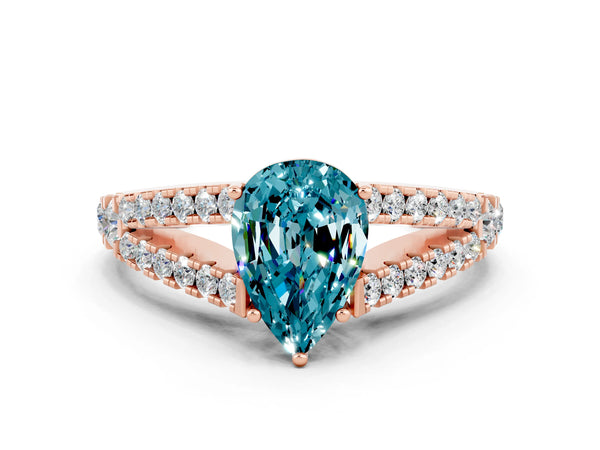 Rose gold Pear Cut Blue Topaz Split Shank Pavé Engagement Ring with Four-Prong Setting