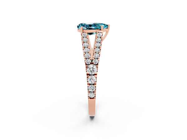 Rose gold Pear Cut Blue Topaz Split Shank Pavé Engagement Ring with Four-Prong Setting