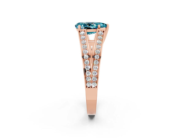 Rose gold Pear Cut Blue Topaz Split Shank Ring with Pavé Band and Four-Prong Setting
