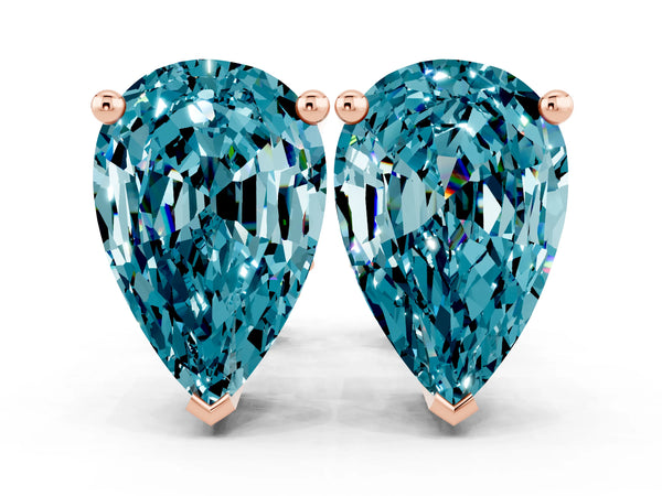 Rose gold Pear Cut Blue Topaz Stud Earrings
