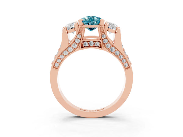 Rose gold Pear Cut Blue Topaz Three-Stone Ring with Channel Set Band and Four-Prong Setting