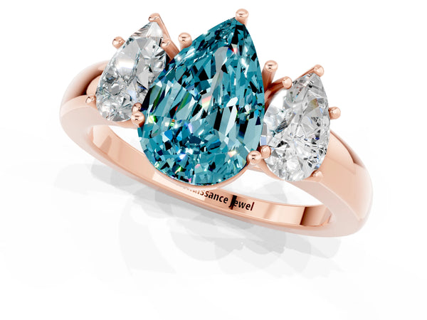 Rose gold Pear Cut Blue Topaz Three-Stone Ring with Four-Prong Setting and Classic Band