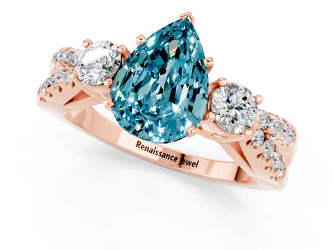 Rose gold Pear Cut Blue Topaz Three-Stone Ring with Pavé Split Shank and Four-Prong Setting_13