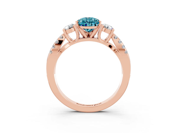 Rose gold Pear Cut Blue Topaz Three-Stone Ring with Pavé Split Shank and Four-Prong Setting
