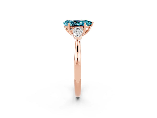 Rose gold Pear Cut Blue Topaz Three-Stone Ring with Pear  Side Stones and Prong Setting