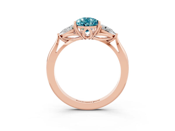Rose gold Pear Cut Blue Topaz Three-Stone Ring with Pear  Side Stones and Prong Setting