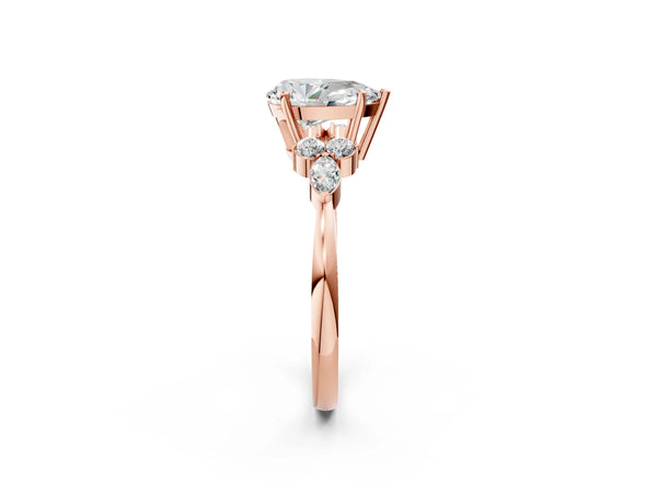 Rose gold Pear Cut Brilliant Diamond Solitaire Ring with Pear Side Stones and Four-Prong Setting
